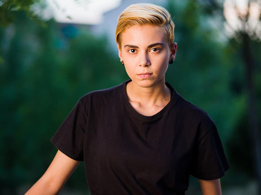 Young woman beauty Tomboy lifestyle with blonde short hair